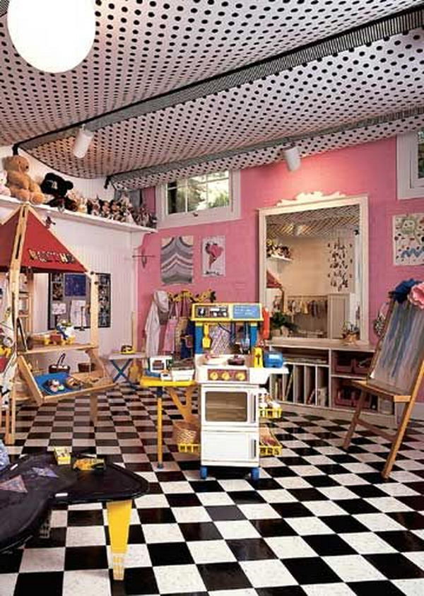 Tented Ceiling Playroom in basement created by stapling fabric panels to exposed floor joists. 