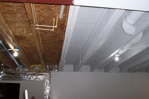 Industrial Look Basement Ceiling Painting. Instead of drywall or drop ceiling, paint it all with an Airless Sprayer in white to make it uniform but blend in and bright. 