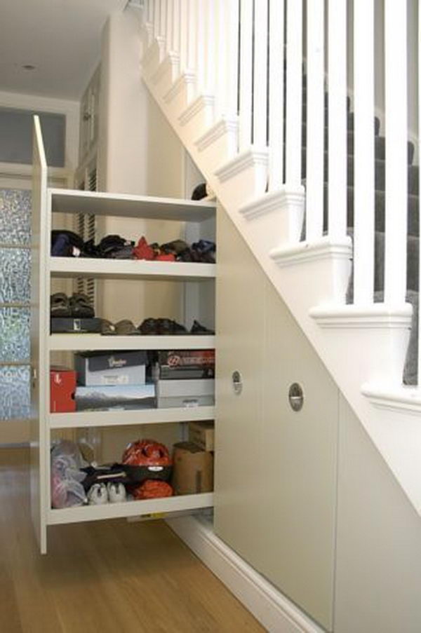 Pull out Storage Under Stairs. Tall broom cupboard with pull out under stairs storage. 