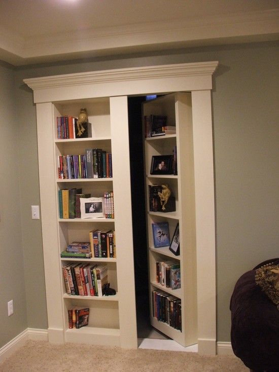 Secret Bookcase Door. Fun and mysterious idea for the basement, with the book shelf/hidden door for extra storage for kids stuff.