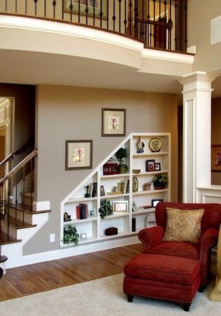 Bookcase in Basement Wall. Bookcase built into the wall gives more space in the room.