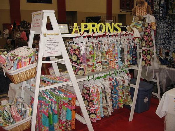 It's fun and easy to display clothes using such painted ladders. 