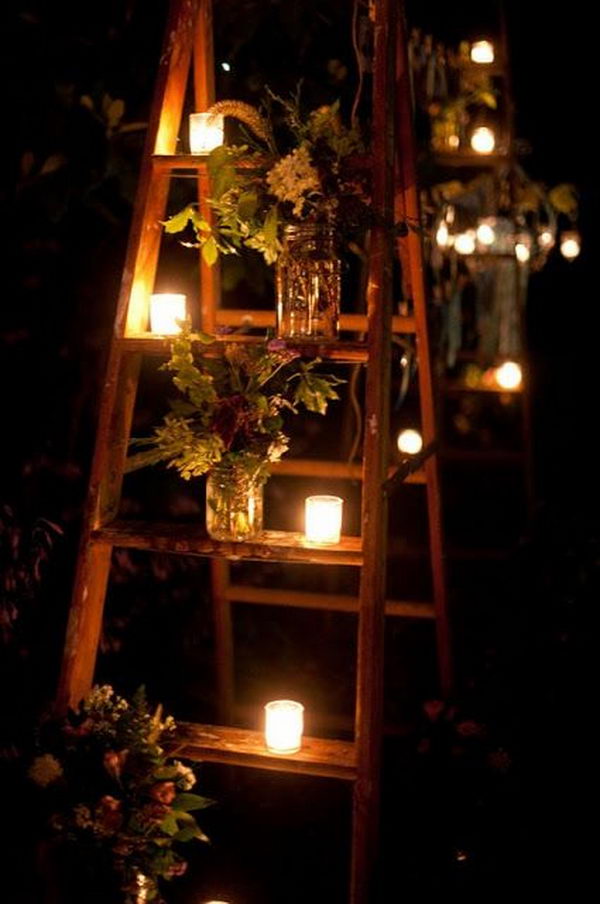 It's neat garden party idea with jars and candles on a ladder. 