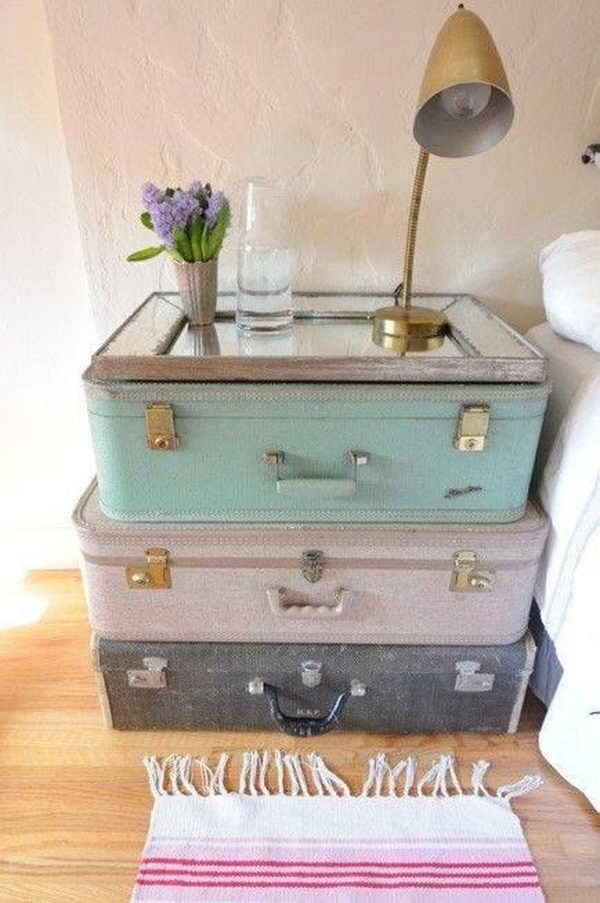 Stacked on top of one another, two or three suitcases can serve as an eye catching, yet perfectly functional DIY nightstand. 