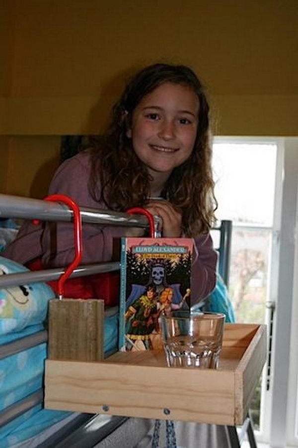 Steve and his daughter Zoe came up with this clever night stand for kids who sleep on the top bunk, which they call the 'flying night stand'. 