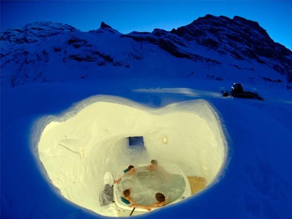 Iglu Dorf Hotel in Switzerland. Built from scratch every winter, it takes almost 3000 tons of snow to create each Igloo. Standard village consists of Igloo Hotel, Igloo Bar, series of tunnels, and smaller Igloos that serve as private rooms. 