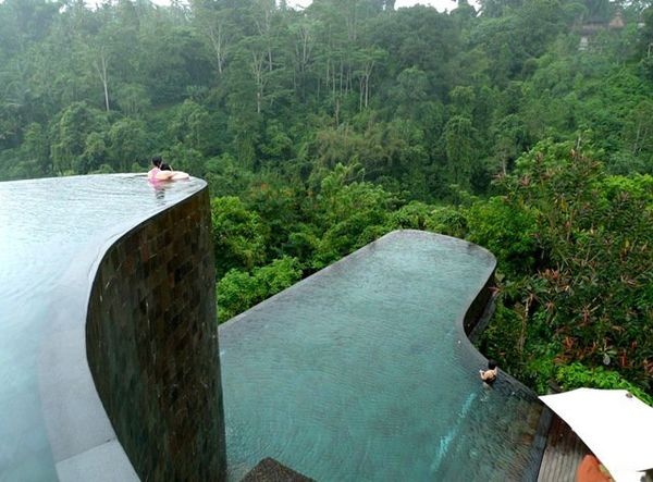 Ubud Hanging Gardens Hotel in Bali. This hotel has a towering, multi leveled infinity pool that looks like a natural cliffside and was in fact designed to mimic the surrounding hills. In addition to the two main pools, each of the 38 guest rooms at Ubud has its own mini infinity pool with views of the nearby Pura Penataran Dalem Segara temple. 