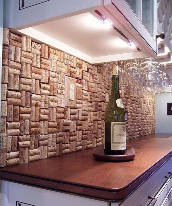 Wine cork backsplash. Not only protect the walls from staining, but also add a decorative touch to your kitchen design. 