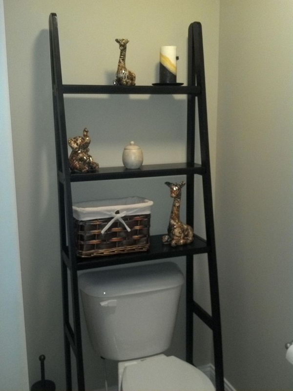 Take a ladder shelf and left out the bottom 2 rows to fit perfectly over the toilet. This could make for extra storage space without looking too bulky. 