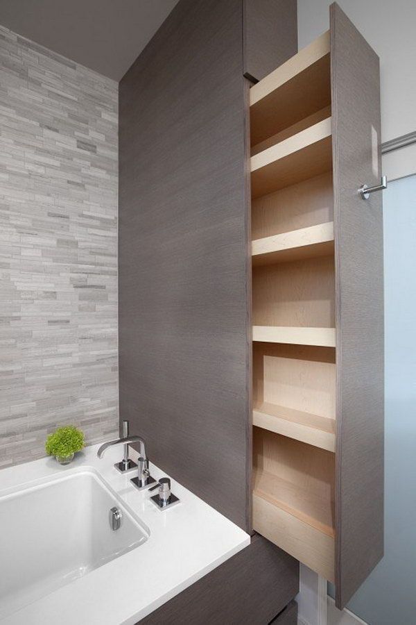 These crawl spaces and nooks between bathtub and wall can be creatively turned into organized storage. 