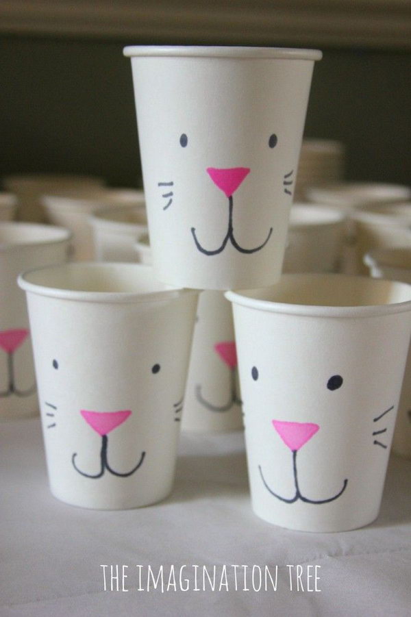 Easter Bunny Treat Cups. Make some simple and cute Easter bunny cups for going on easter egg hunts or giving treats in. It's an easy decoration and DIY gift idea for an Easter party. 