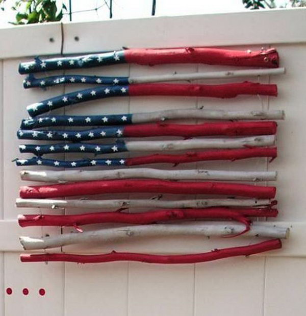DIY Stick Flag. A cute idea to hang this twig flag on on front door for July 4th. 