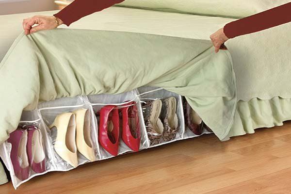 Bed Skirt Shoe Organizer. Free up valuable space in your bedroom with this innovative bed skirt organizer. It's a very clever shoe storage idea for small bedroom. The bed skirt completely covers shoe organizer and make it well hidden but still have easy access. 