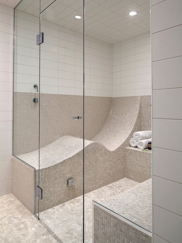 Letter S shaped seat. An S shaped seat turns your shower or steam room into one that you can lie down in. 