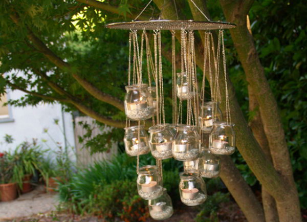 Garden Chandelier. It's super chic to add soft, eco friendly candlelight to your garden with this beautiful chandelier made from baby food jars as well as circular cooling rack. 