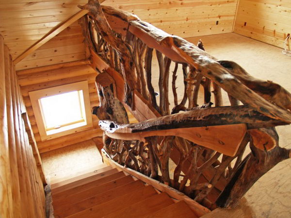 Thick, rough cut tree railing.  No matter what style you choose, nothing does more to determine your deck's look than railing. These creative thick, rough cut rails add powerful muscle to the rustic look and you can have a try on your own deck. 