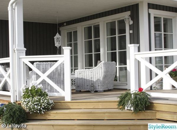 Natural color deck and the white X shape railing. Stylish X shape decorations become more and more popular these days. Awesome white X shape rails add to a delicate custom look to the natural color deck. 