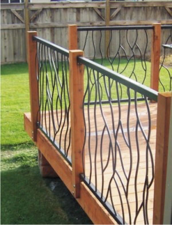 Iron deck railing. Very modern and special look. Forged iron custom made to look like tree branches. 