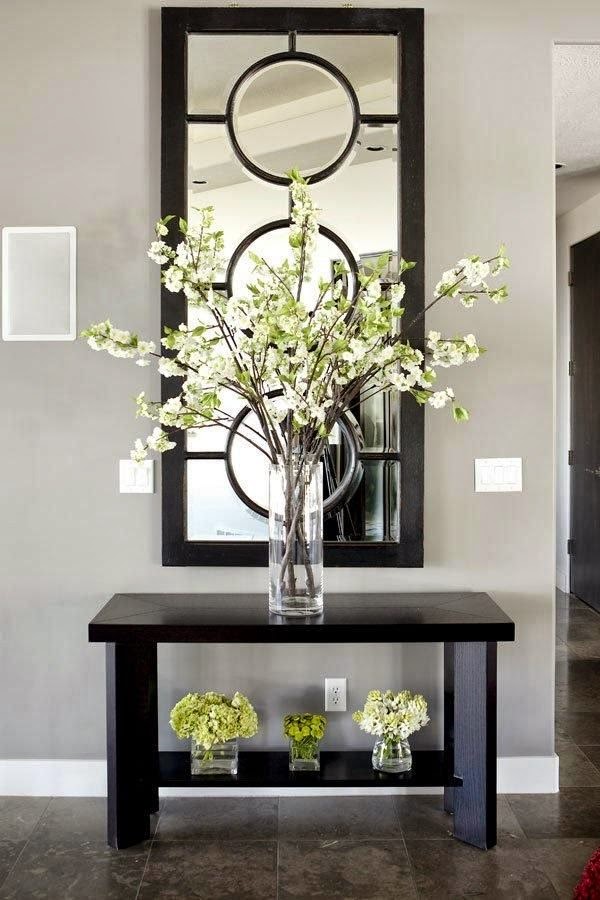 Mirror as a decor at home. This is a very common type of decorating a room with mirrors to be your entrance hall. The mirror also helps give more sense of space and brings more brightness to your home. 