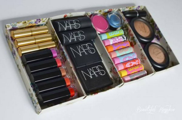 Gift boxes repurposed as makeup storage. Do you have countless empty boxes and packaging lying around after Christmas? Just discard them? No!!! Stick them together; you will get bigger and practical makeup storage. 