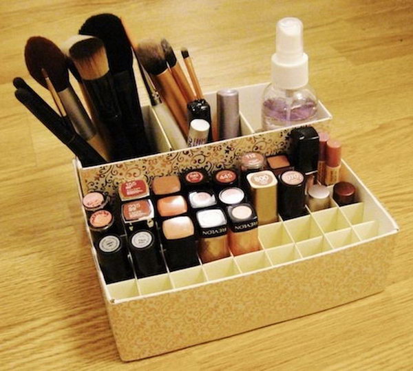 Makeup holder from cereal and oatmeal boxes. This incredibly simple organizer for makeup is made from the common cereal and oatmeal boxes. Of course, you can use other boxes in hand. 