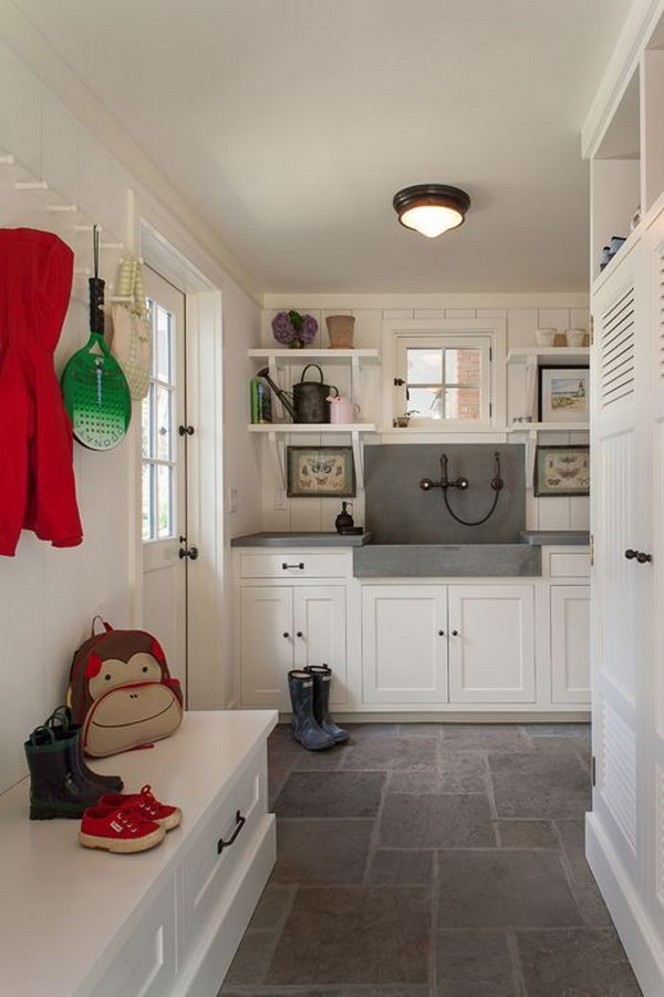  Keep the mud from the room- you can wash off before you come in the house! Pretty floor eccoes the marble countertops. And there are so many cabinets to put in your shoes and other stuff. I'm in love with the cute shelves and hooks. 