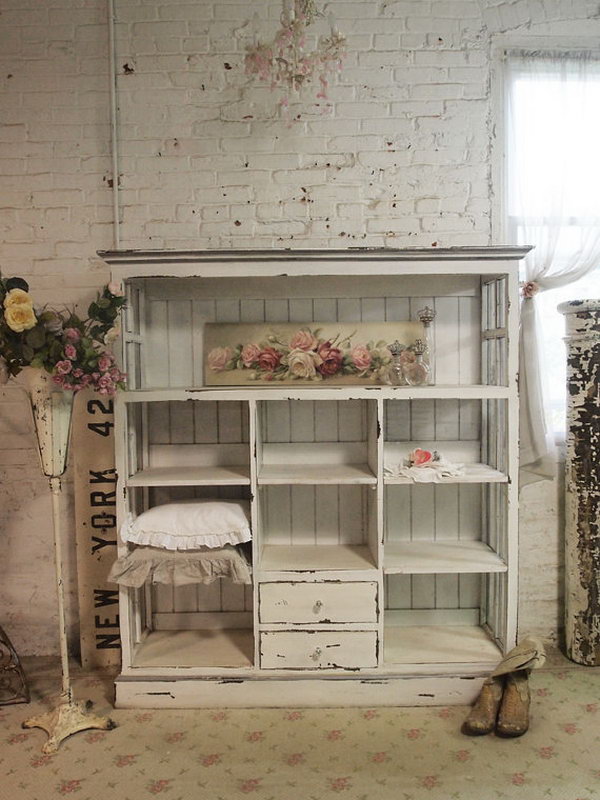 Shabby handmade cabinet   distressed paint finish on a bookcase made from salvaged wood and windows. The cabinet is gorgeous and fitting a french mudroom very much as a storage. It's just what you want to add shabby chic sophistication to the mudroom! 