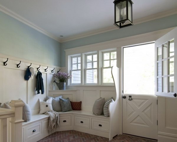  Soft blue and white. If you want a fresh and clean look to go with your mudroom. This one is a great inspiring. Every detail of this mudroom is perfectly organized including the tiles, benches, drawers, the dutch door, windows, hooks, lantern...and everything. 