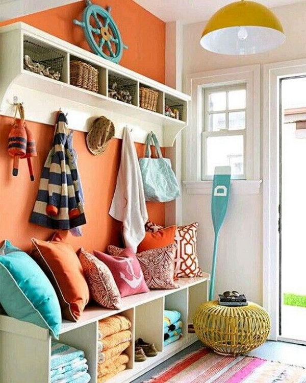 Fantastic colorful mudroom.  Love the bright color palette, orange, yellow, green, white.  Simply beautiful details through out! Great for the kids. 