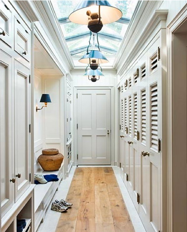 Gorgeous locker for each family member. At the first glance I loved the last shot  stunning. And deeply shocked by the powerful storage function then. One can never have too much storage. Love plenty of built in cabintry. How elegant the shutter, the traditional doors and the skylights are. 