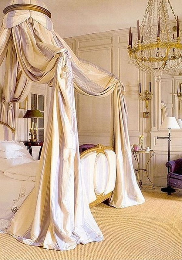 Breathtaking Master Bedroom: The soft lavender striped crown canopy, the perfectly ornate chandelier and elegant wood panelled walls, the scallop trim linens and luxurious gilded bed — so many beautiful details 