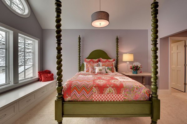 Eye catching Green Bed: Lavender walls in contrast with the  4  poster green bed add to drama to this bedroom. The large window let light in and keep this room visually spacious. The white  built in seat is both a reading nook and storage  such clean lines in this room. 