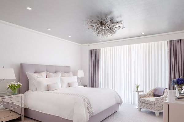 Grey purple Color for a Tumblr Feel. This simple bedroom with the Lilac color palette is so soothing yet chic.  The details: The light fixture, curtain and sheer track concealed behind a bulkhead, the lavender ceiling, the mirrored night stand, the bedding. 