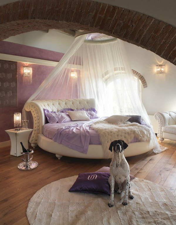 Modern Purple Bedroom: There is so much I love about this room, the colour, the brick arch, the unique bed shape, the nightstand, the lighting and all. 