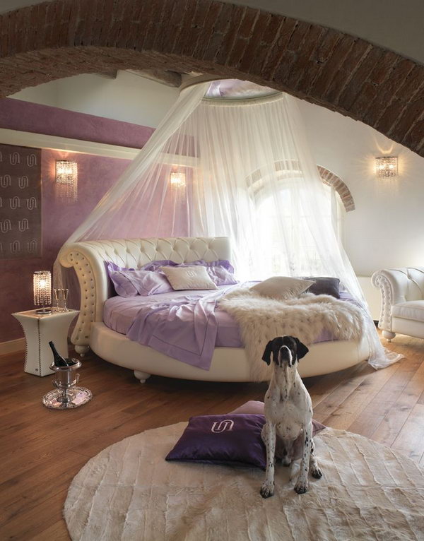 Modern Purple Bedroom: There is so much I love about this room, the colour, the brick arch, the unique bed shape, the nightstand, the lighting and all.