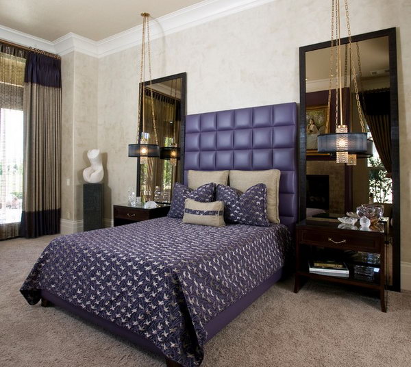 Purple Leather Headboard: The purple tufted headboard and the oversized mirrors make for a grand master bedroom retreat. I love their drama, the striking accent tile gives this bathroom a hint of excitement. 