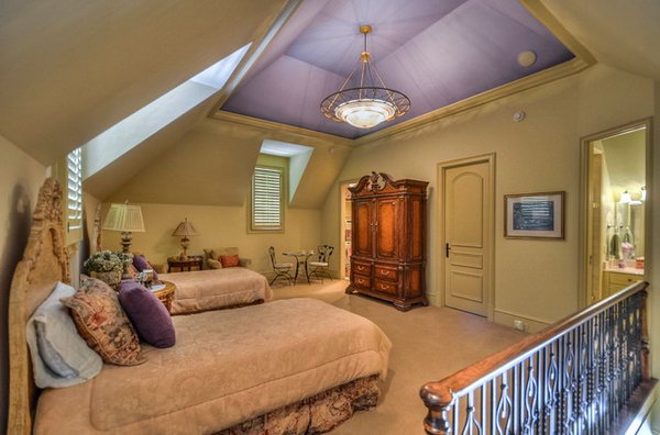 Clever Purple Ceiling with Gold walls: How fanciful and carefree. The colors in it are comforting. I like the high ceiling and how it is painted the same purple as a pillow on the bed and they add class to this bedroom. The railing is also great! 