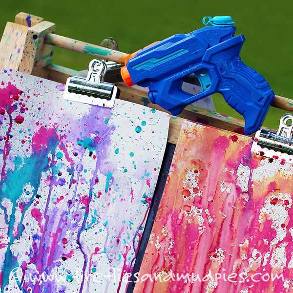 Squirt gun painting. This fun art project is such an awesome summer activity  Hang up a few white sheets on a line. Fill up water guns with different water colors and let the kids make their masterpiece. 