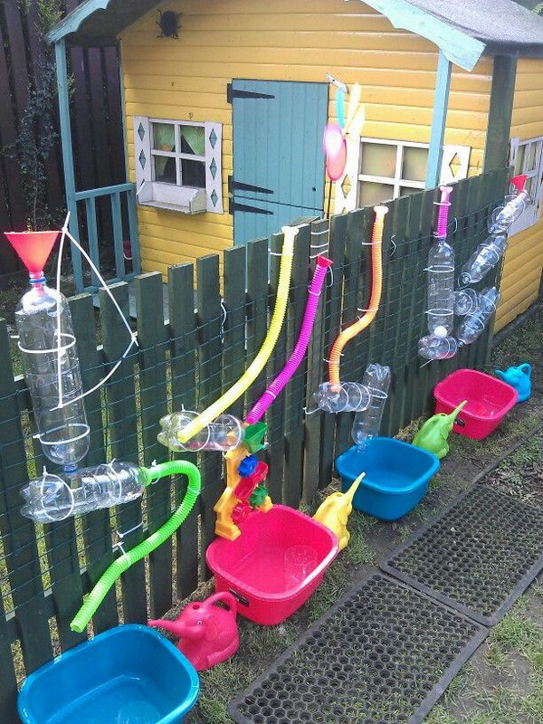 Keep your little ones busy. Great for warmer weather fun. Tack PVC bottles and pipes to a wooden post . Add water, get fun! 