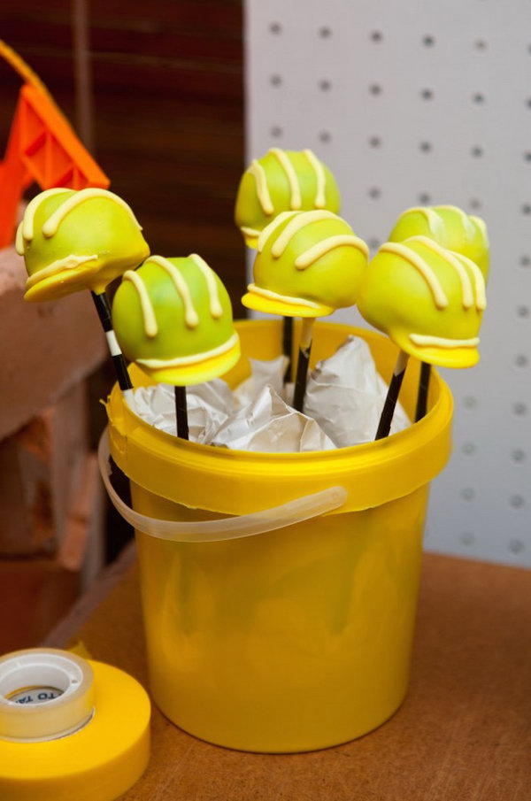 Cute Hard Helmet Cake Pops: What cute hard helmet cake pops. They really further the construction theme. 