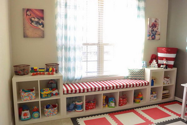 Ikea Kallax Hack: Playroom Storage. Personalize your space by combining different Kallax shelving units like this and adding a custom cushion on the top to make a complete look in your space. 