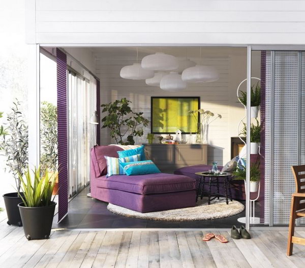 Romantic & Glamorous IKEA Living Room. Purple and white are a fantastic color combination. Purple sofas , white lights plus some potted plants add a touch of romance and comfy to this living room. Besides, the big glass door is really a fantastic design and bring more brightness. Love everything in this living space. 