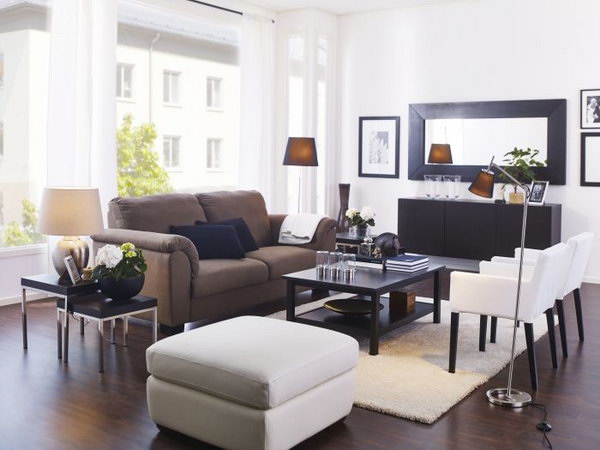 With distinctive frames and shapes, mirrors can really enhance your décor. Larger wall mirrors, or smaller ones grouped together, make this living room look brighter and bigger. 