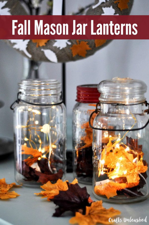 DIY Fall Decor Mason Jar Lanterns. Beautiful, festive and awesome! They are a beautiful and easy way to add some fall color and festivity to nearly any space in your home-your mantel, bookshelf, entryway table, anywhere! 