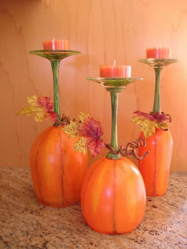 Pumpkin Patch Wine Glass Candle. Wine glasses painted like pumpkins and used as candleholders. How cute! 