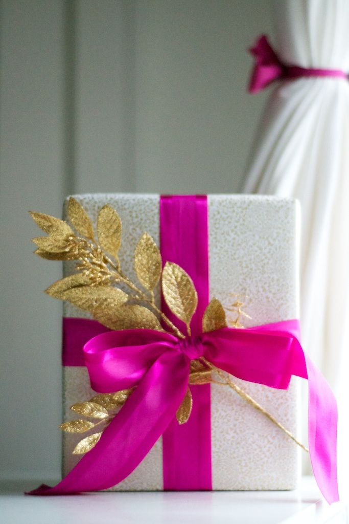 Pink Bow with Gold Glittery Branch Gift Wrapping. 