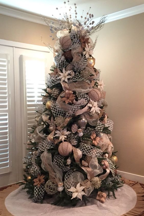 Christmas Tree With Burlap Decor and Gold Ornaments. 