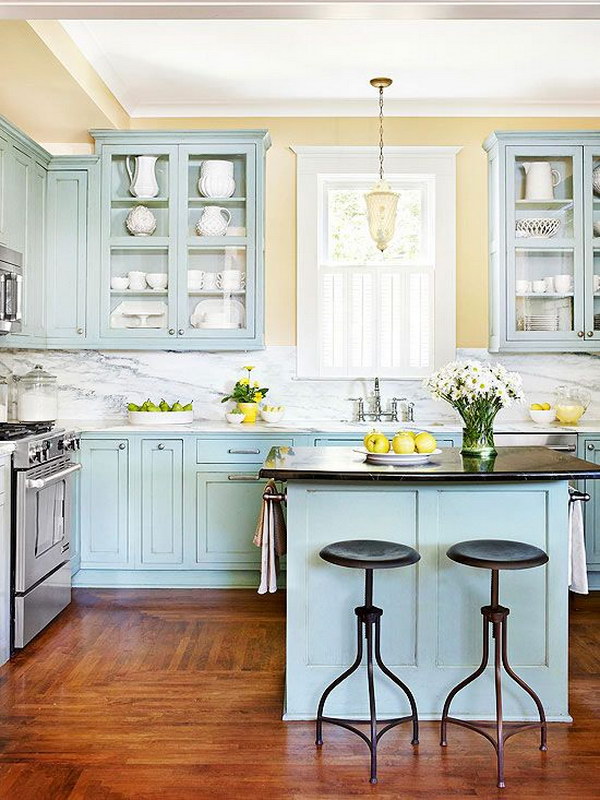 Blue-green Kitchen Cabinets with Glass Cupboards for Display. 