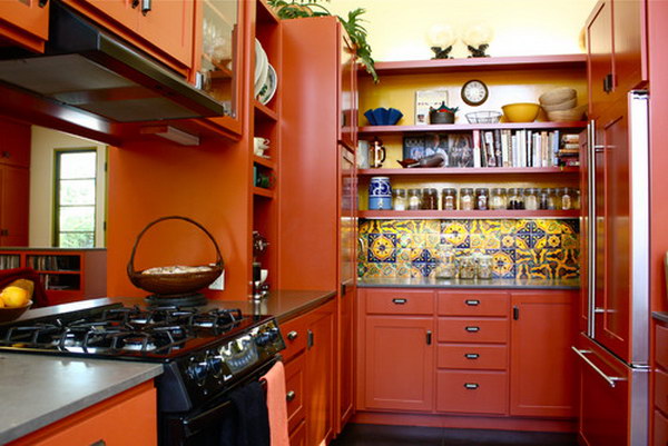 Rich Red-Orange Open Cabinets With Multicolored Backsplash And Paneled Appliances. 