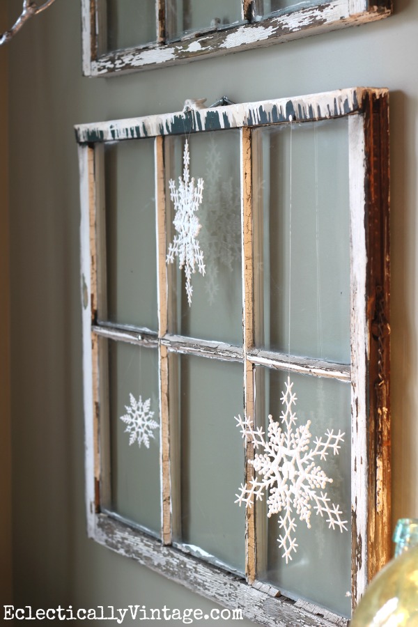 Rustic Christmas Window Decoration with Snowflakes. 